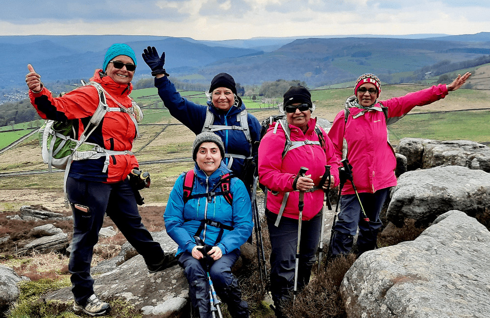 Corporate Group on Over Owler Tor Peak District. Diversity