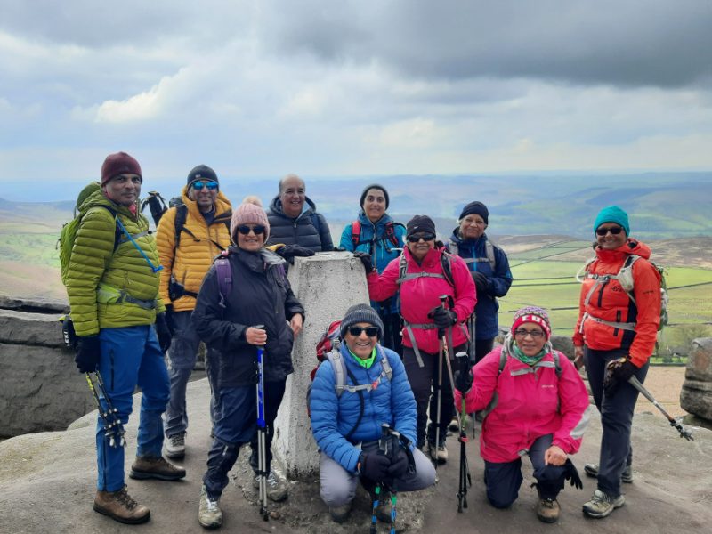 Group on Stanage Edge Trig Point Peak District
