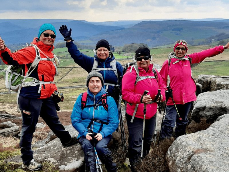 Corporate Group on Over Owler Tor Peak District. Diversity